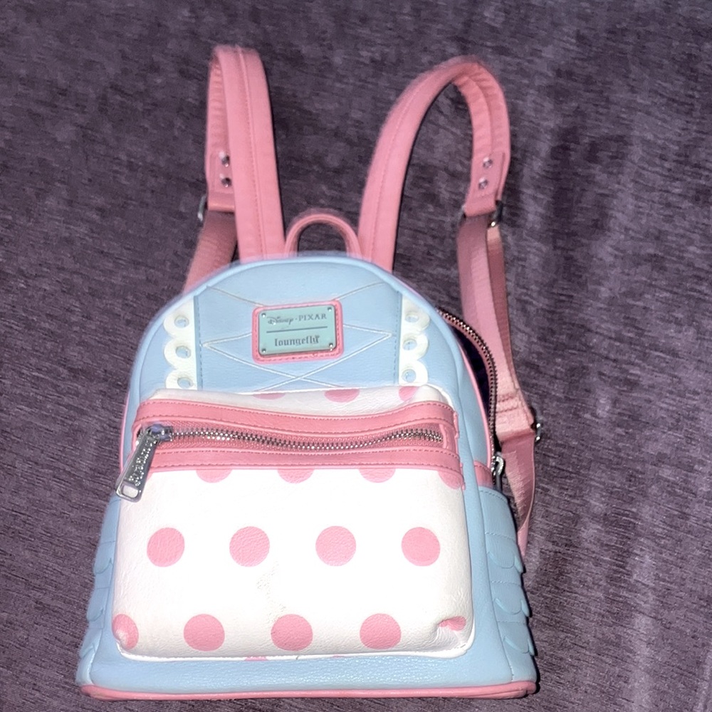 I’m selling a Disney +Pixar original bag  it’s a mini bag